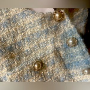 Tweed jacket with jewel buttons